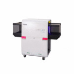 ORION 918CX, Rapiscan ORION 918CX, ORION 918CX X-Ray Scanner, ORION 918CX Baggage Scanner, 918CX X-Ray Machine, Baggage X-Ray Scanner, Airport Security X-Ray Machine, Security Screening System, Carry-On Baggage Scanner, Parcel Inspection System, Cabin Baggage X-Ray Scanner, Checkpoint X-Ray Scanner, High Performance X-Ray Scanner, Compact X-Ray Scanner, Conveyor X-Ray Scanner, Security Inspection Equipment, X-Ray Baggage Inspection System, Parcel Screening Equipment, Mail Screening X-Ray System, Small Parcel X-Ray Scanner, Security X-Ray Machine, Dual Energy X-Ray Scanner, Material Discrimination X-Ray, Organic Material Detection, Inorganic Material Detection, Spectrum 4 Color Imaging, SP4 Imaging Technology, Dual Mode Z Effective, Z Effective Imaging, Explosives Detection System, Narcotics Detection System, Target Detection Software, NARCScan Technology, Automatic Threat Detection, Threat Image Projection, Image Enhancement Software, Low Density Image Enhancement, High Resolution X-Ray Imaging, Best Resolution X-Ray Scanner, Security Imaging System, Operator Assist X-Ray System, ScanOS Software, 64 Bit Windows X-Ray System, Aviation Security Scanner, Airport Checkpoint Scanner, Border Security X-Ray System, Customs Inspection Equipment, Critical Infrastructure Security, Government Security Screening, Law Enforcement Screening Equipment, Military Security Scanner, Port Security X-Ray Machine, Courier Screening System, Logistics Security Scanner, Warehouse Security Screening, Corporate Security X-Ray Machine, Building Entrance X-Ray Scanner, Event Security X-Ray Scanner, Prison Security Scanner, Court Security X-Ray System, Embassy Security Equipment, Remote Viewing X-Ray System, Networked X-Ray Scanner, Matrixing X-Ray System, Image Archiving X-Ray Scanner, Security Screening Technology, Advanced Threat Detection X-Ray, High Throughput X-Ray Scanner, Compact Baggage Inspection System, Security Checkpoint Equipment, Tunnel Size 540 x 360 mm, 540 x 360mm X-Ray Scanner, EC Aviation Compliant X-Ray System, X-Ray Machine for Airports, Parcel and Baggage Inspection, Professional X-Ray Inspection System, Security Screening Solutions, Rapiscan Security Equipment, ORION X-Ray Series, Baggage Inspection Equipment, X-Ray Scanner Manufacturer. The ORION 918CX features a 540 × 360 mm tunnel, Spectrum 4-Color Imaging, Dual Mode Z-effective material discrimination, explosives and narcotics detection, networking, remote viewing, and high-resolution image processing for checkpoint baggage inspection.